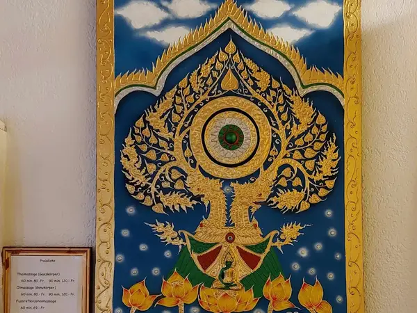 Decorative Thai wall art with a price list in a salon interior